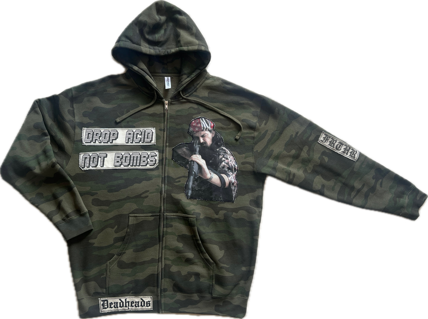 Camo zip up hoodie with Pigpen and Drop Acid Not Bombs patches, size Men’s XL